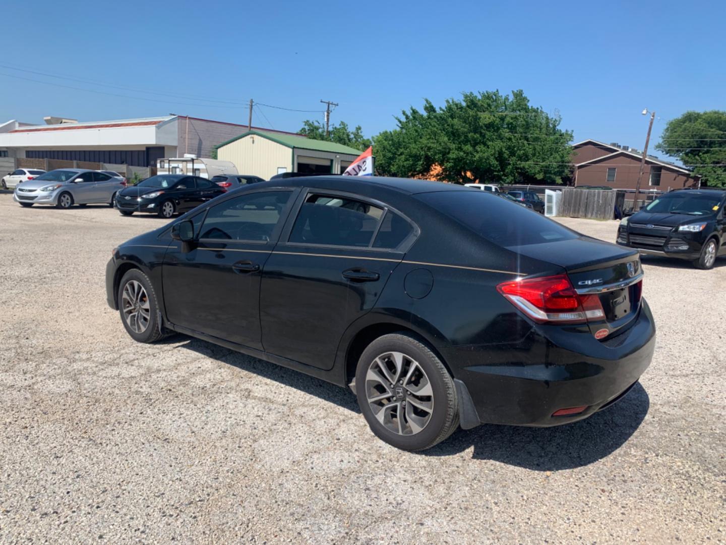 2013 Black Honda Civic EX-L Sedan AT (2HGFB2F9XDH) with an 1.8L L4 SOHC 16V engine, Automatic transmission, located at 1830 North Belt Line Road, Irving, TX, 75061, (469) 524-0199, 32.834373, -96.993584 - Photo#5